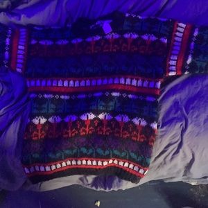 A knitted sweater in good condition and NEVER WORN!!